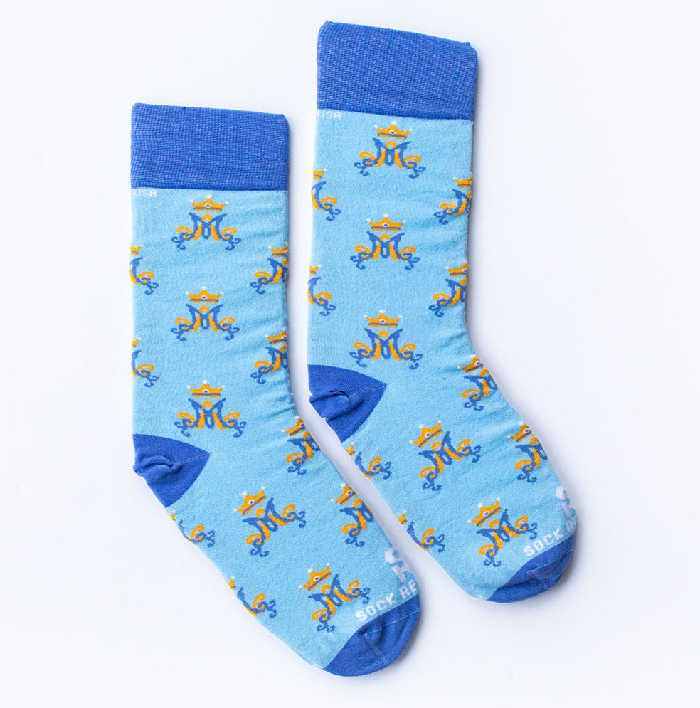 a pair of blue socks with yellow and blue colors