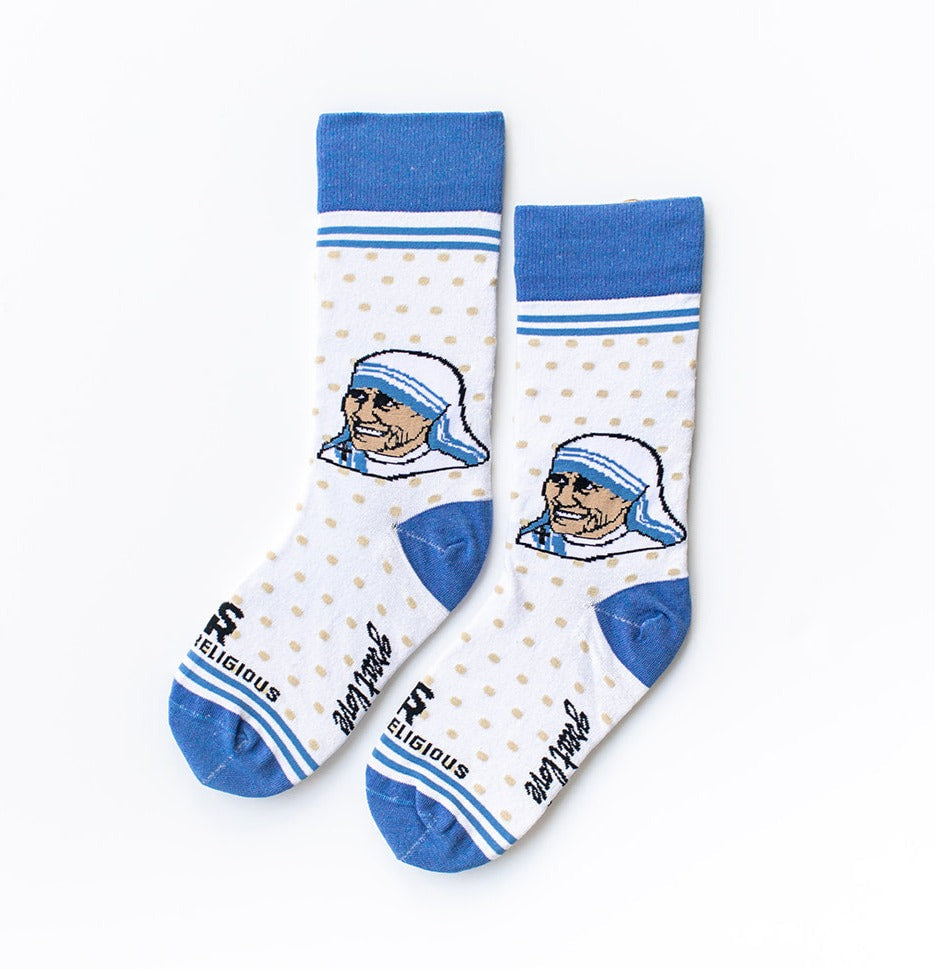 a pair of blue and white socks with a picture of a man wearing a hat