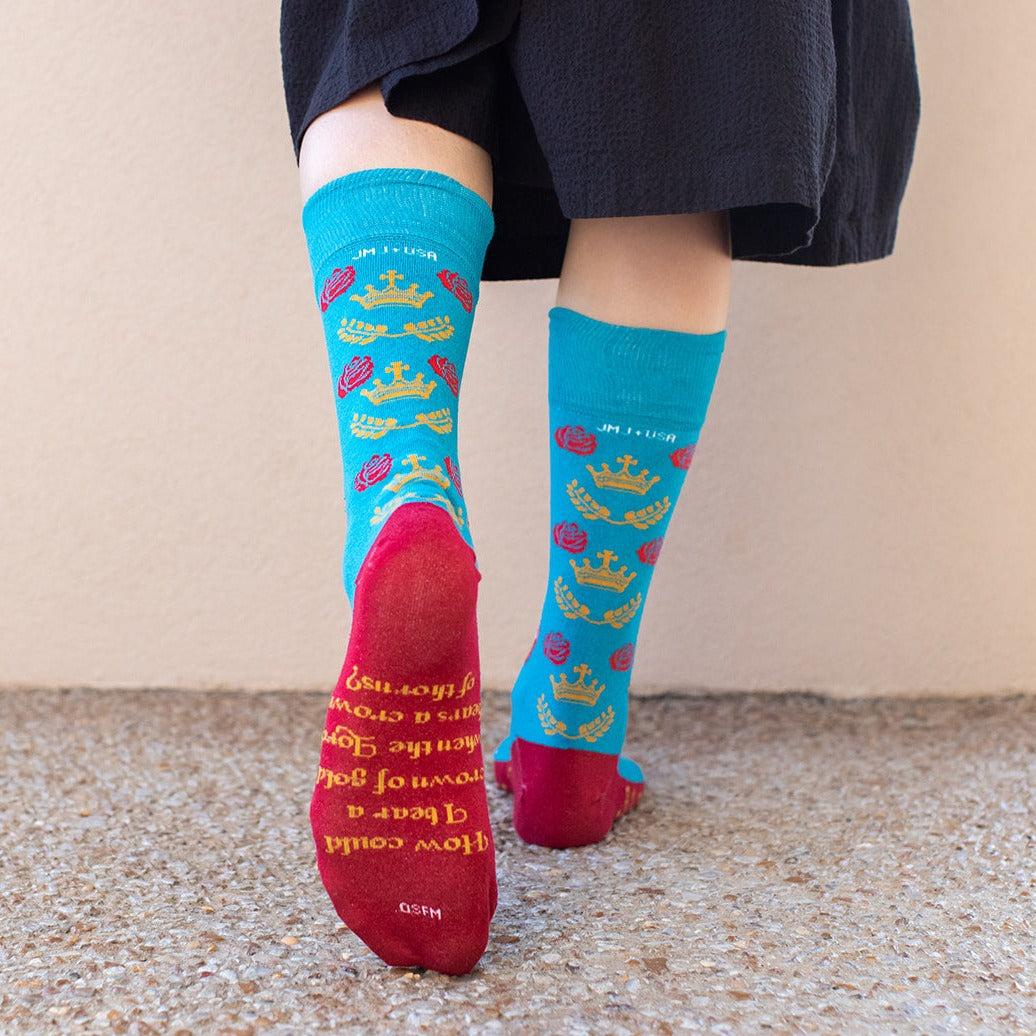 a woman wearing a pair of colorful socks