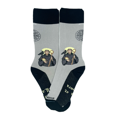 a pair of socks with a picture of St. Benedict