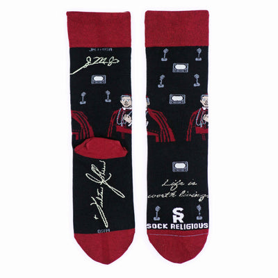 a pair of socks with a picture of a person on it