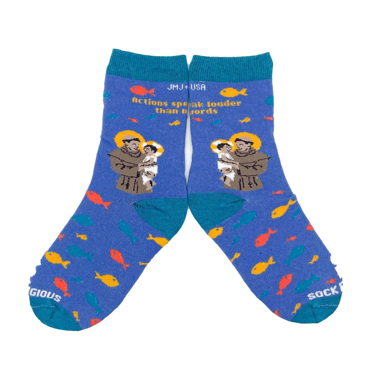 blue socks featuring St. Anthony holding the infant Jesus with several fish and the words "Actions speak louder than words" along the calf flat lay