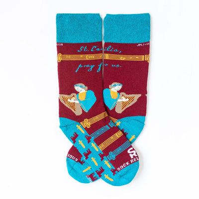 a pair of socks with a picture of St. Cecilia