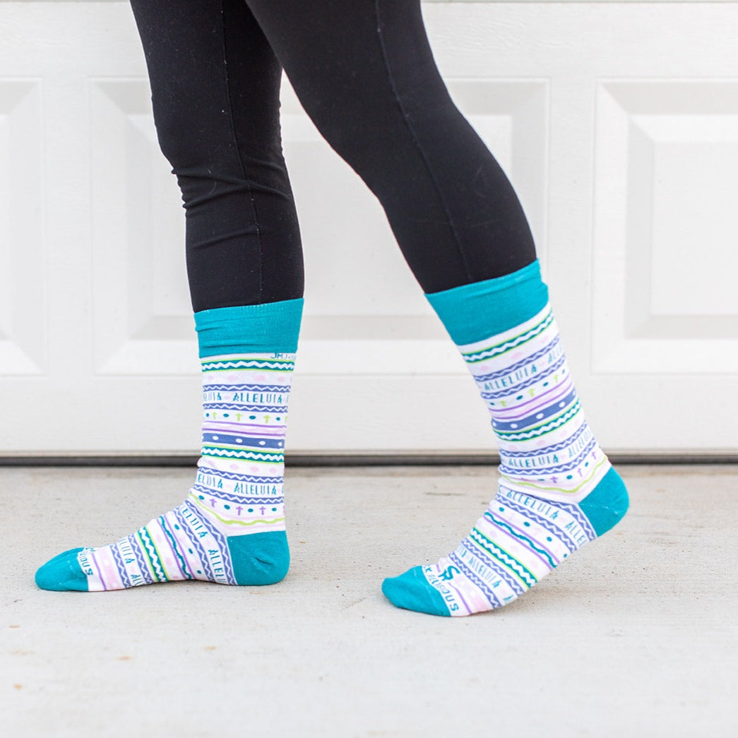 a woman wearing a pair of colorful socks
