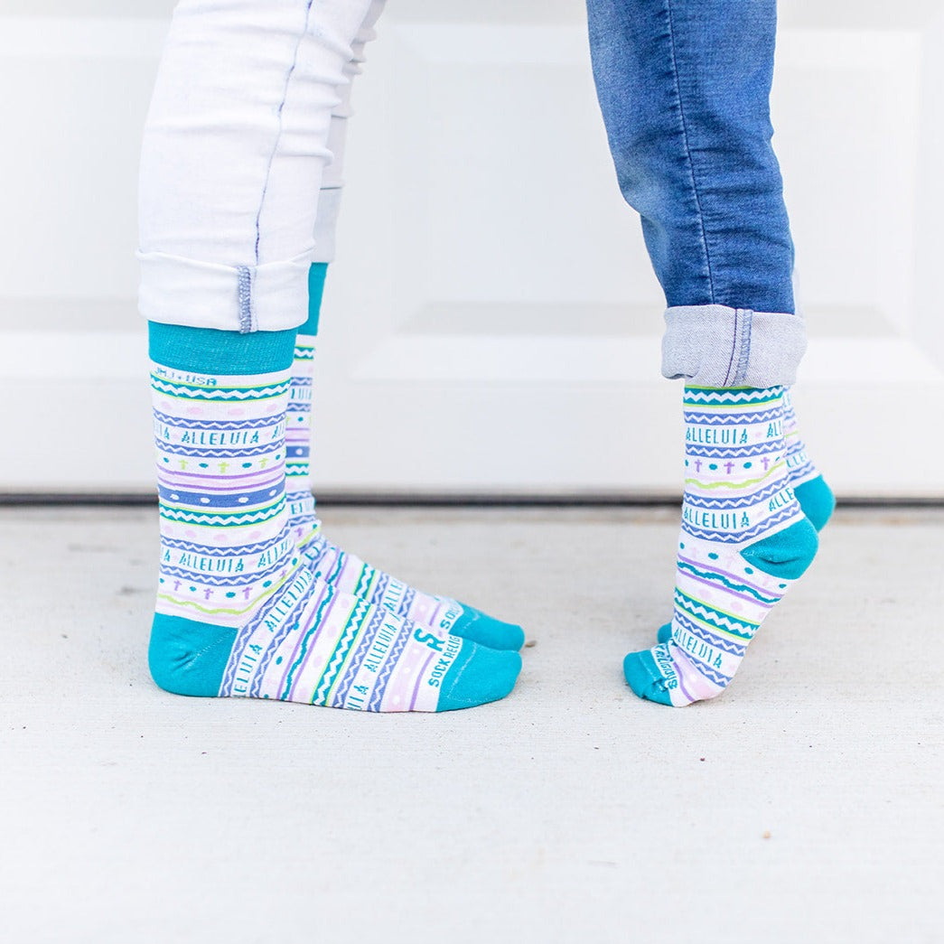 two person wearing a pair of colorful socks