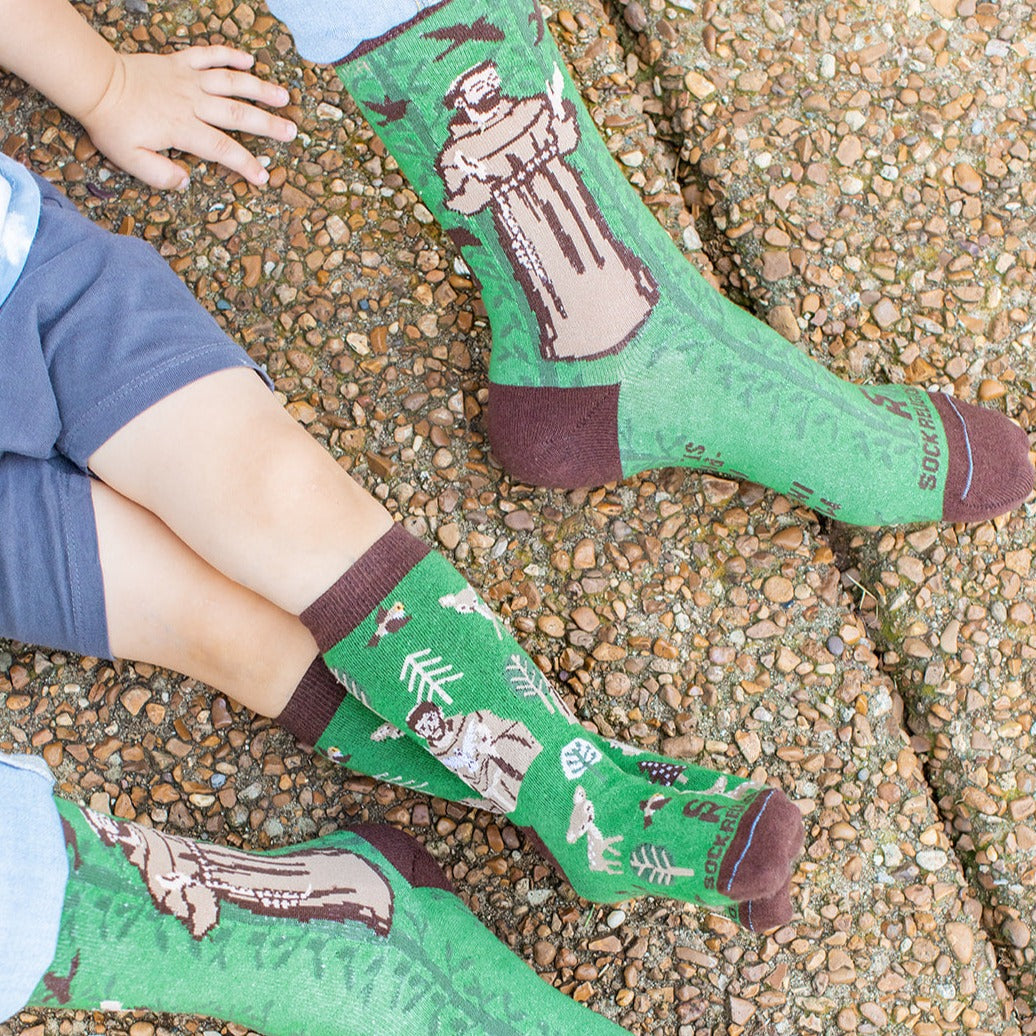 a father and son wearing St. Francis of Assisi socks