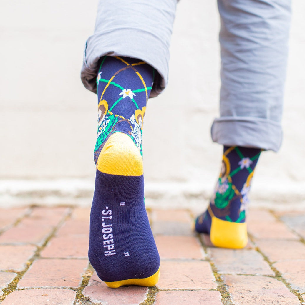 Navy blue St. Joseph adult XL socks showing bottom of foot that says " (empty quotes). " - St. Joseph