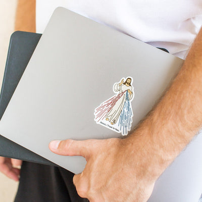 Divine Mercy Image of Jesus on a sticker that says "Jesus, I trust in you" on a laptop
