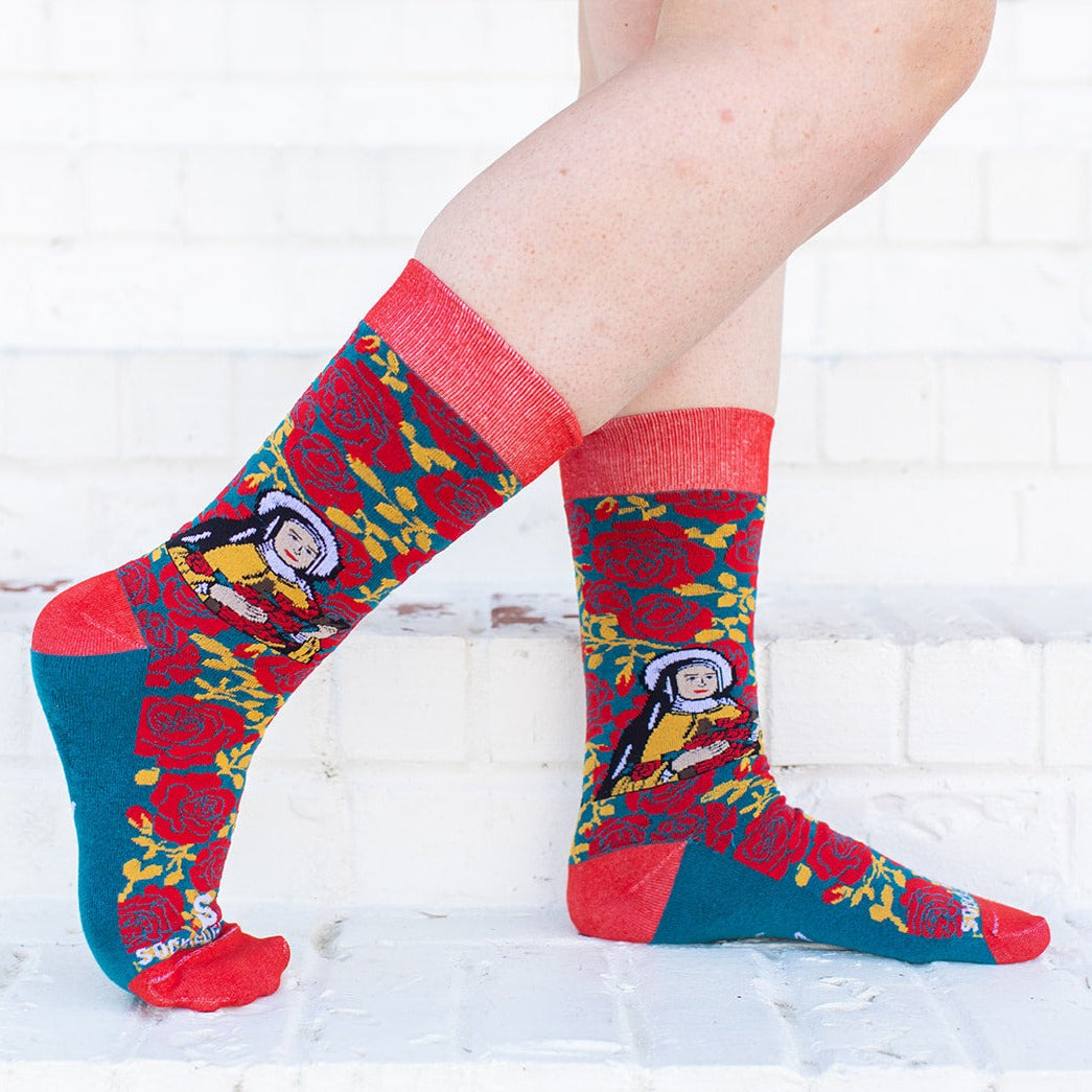 a woman wearing St. Therese socks straight on shot