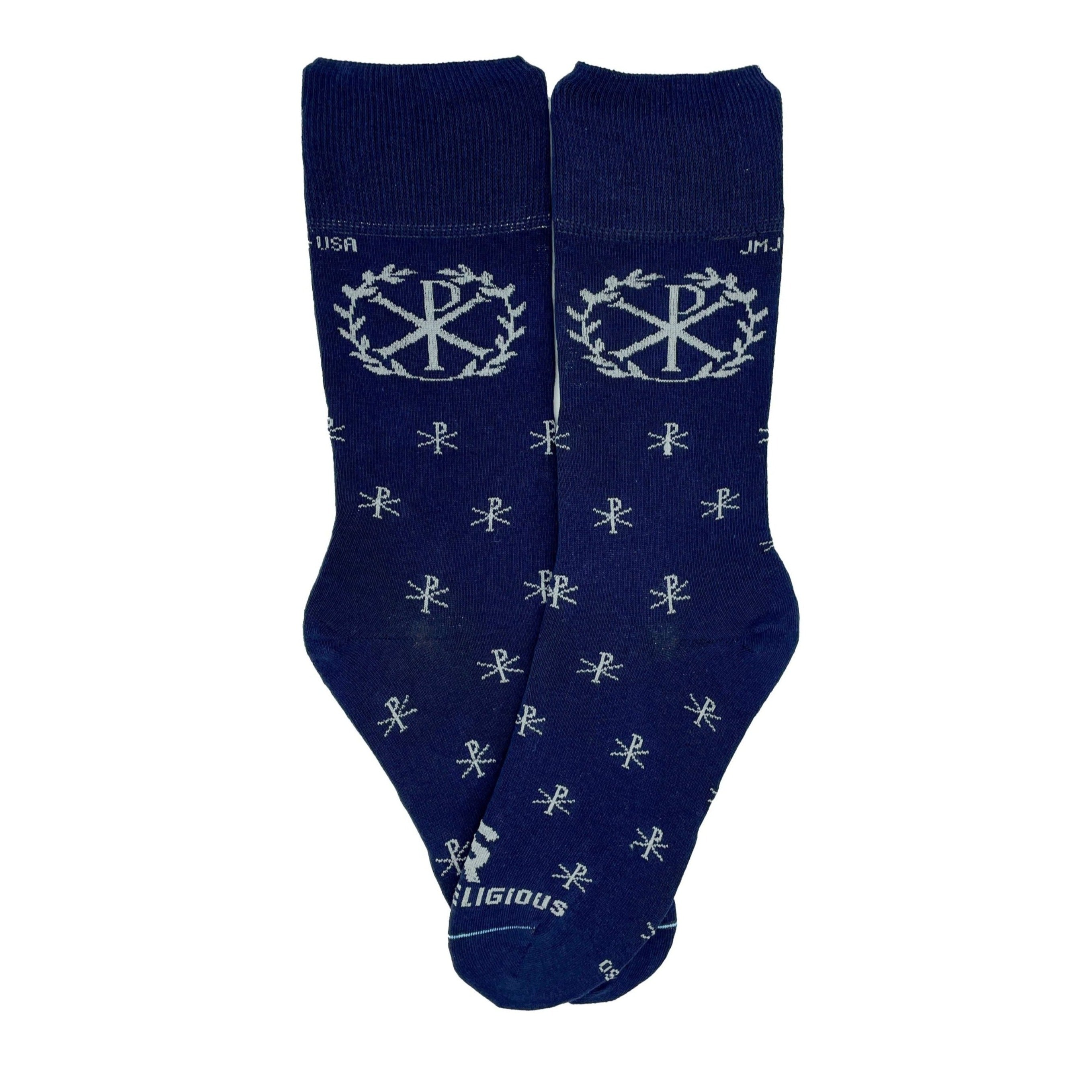 A pair of blue socks with a deign on it