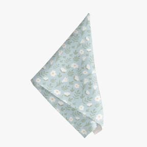 Baby blue Easter Alleluia napkin with simple white floral design, shown on a white background.