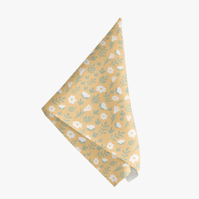 Yellow Easter Alleluia napkin with simple white floral design, shown on a white background.