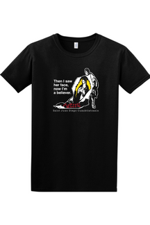 black t-shirt with St. Juan Diego wearing tilma that shows Our Lady of Guadalupe. Shirt says "Then I saw her face, now I'm a believer"