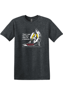 dark gray t-shirt with St. Juan Diego wearing tilma that shows Our Lady of Guadalupe. Shirt says "Then I saw her face, now I'm a believer"
