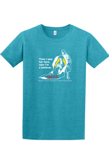 teal t-shirt with St. Juan Diego wearing tilma that shows Our Lady of Guadalupe. Shirt says "Then I saw her face, now I'm a believer"