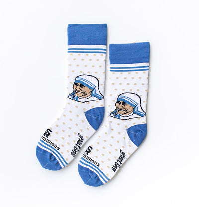 a pair of blue and white socks with a picture of a man wearing a hat