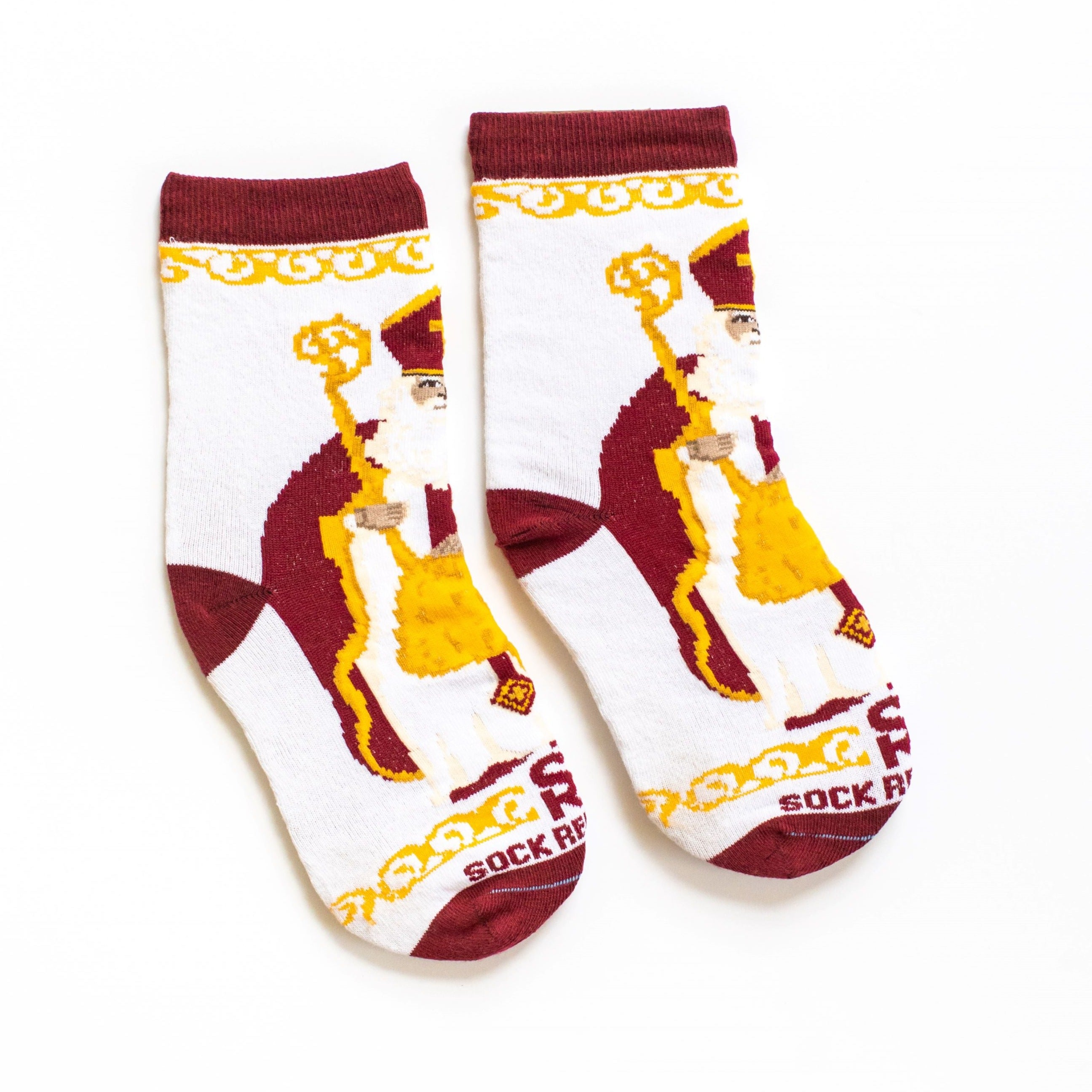 flatlay of white socks featuring large image of St. Nicholas the bishop