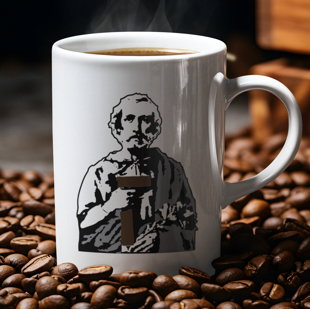 front of coffee mug with image of st. Joseph the worker in gray tones