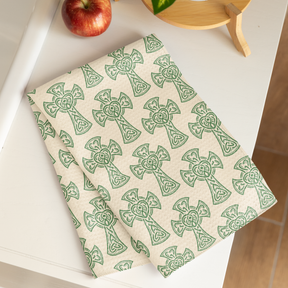 Irish Blessing Dish Towel cream background with repeating High Cross pattern - laying on table - Catholic Dish Towel - Catholic Decor