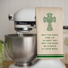 Irish Blessing Dish Towel with High Cross and words "May the road rise up to meet you may the wind be always at your back" - hanging over a standing mixer