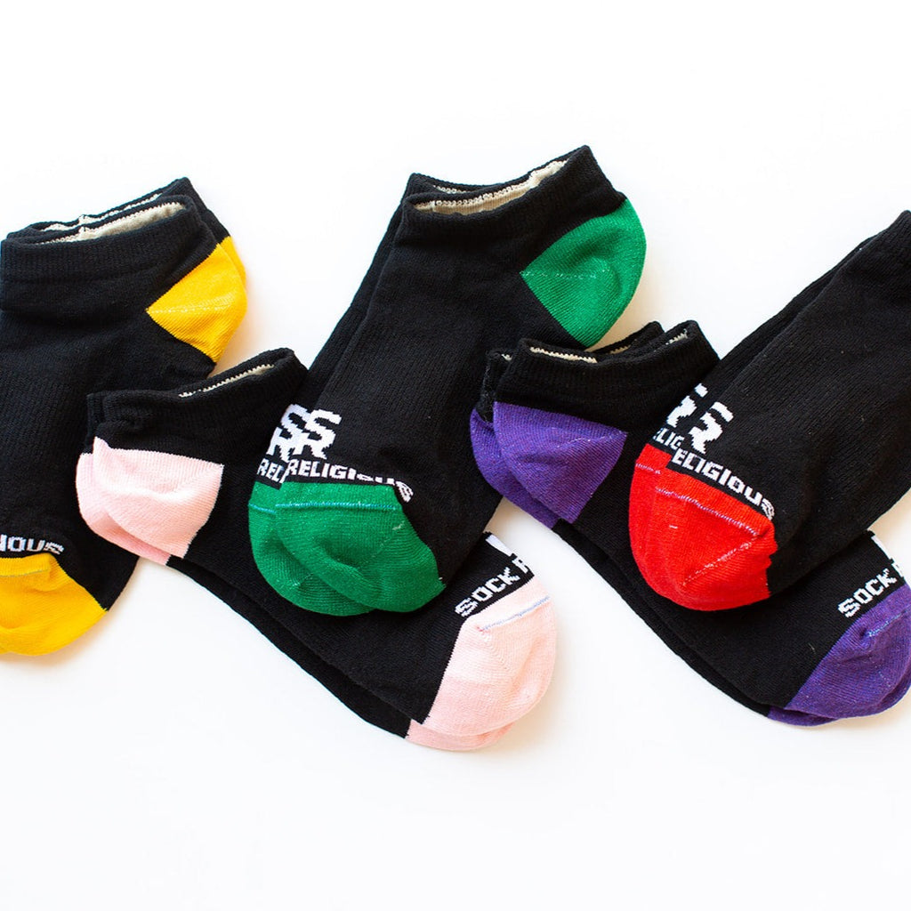 three pairs of colorful socks 