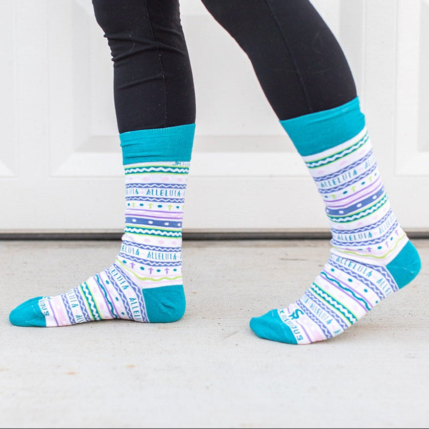 a woman wearing a pair of colorful socks