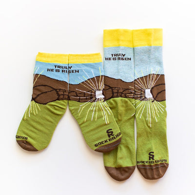 a pair of socks with a picture of a mountain
