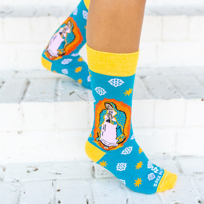 Person on steps wearing Our Lady of Guadalupe Adult Dress Socks