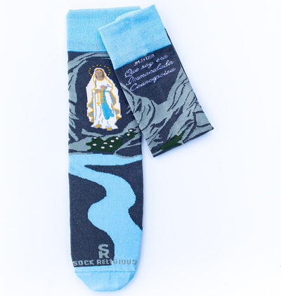a pair of socks with a picture of Our Lady of Lourdes