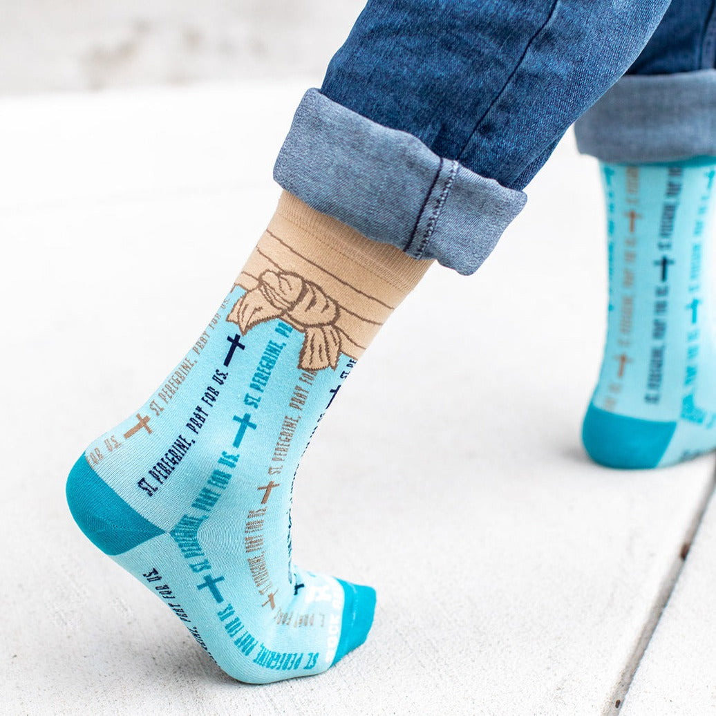 a person wearing a pair of blue socks with words on them