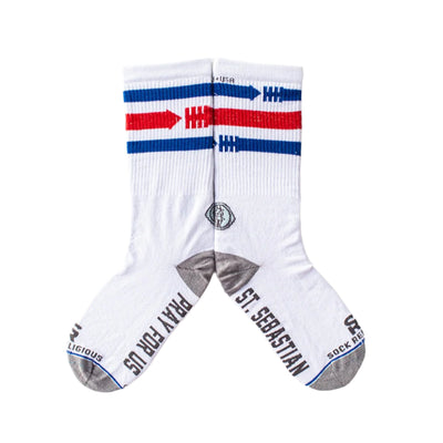 a pair of white socks with red, white, and blue stripes