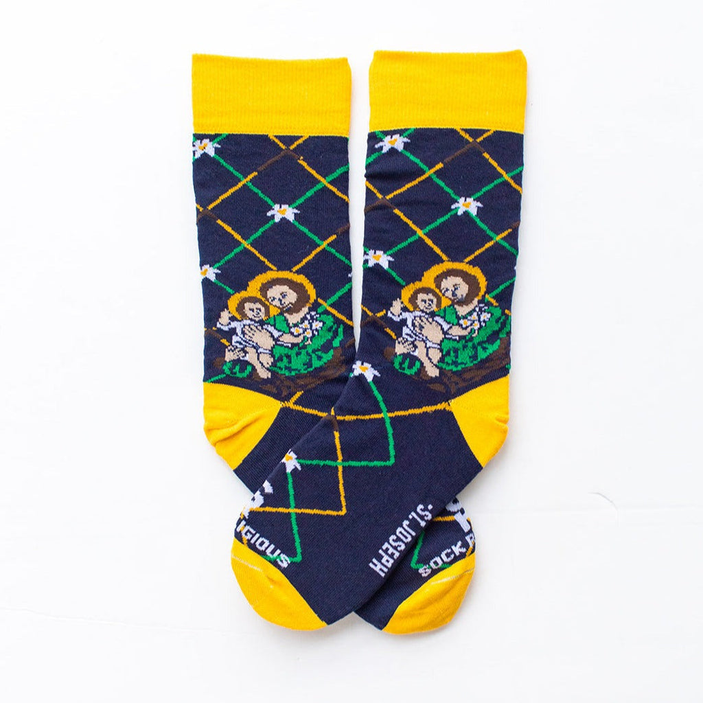 Navy blue St. Joseph adult XL socks with Joseph holding baby Jesus. Yellow and green argyle lines