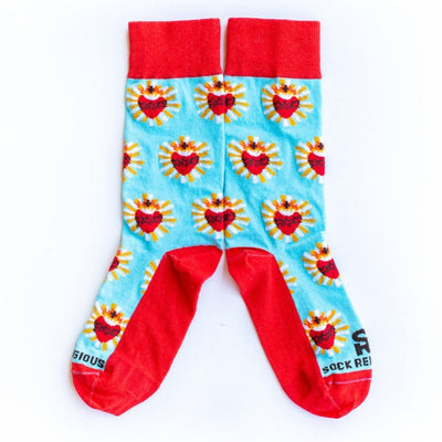 a pair of red and blue Sacred Heart socks