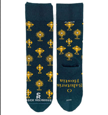 A stylish pair of teal socks featuring shiny golden monstrances and text